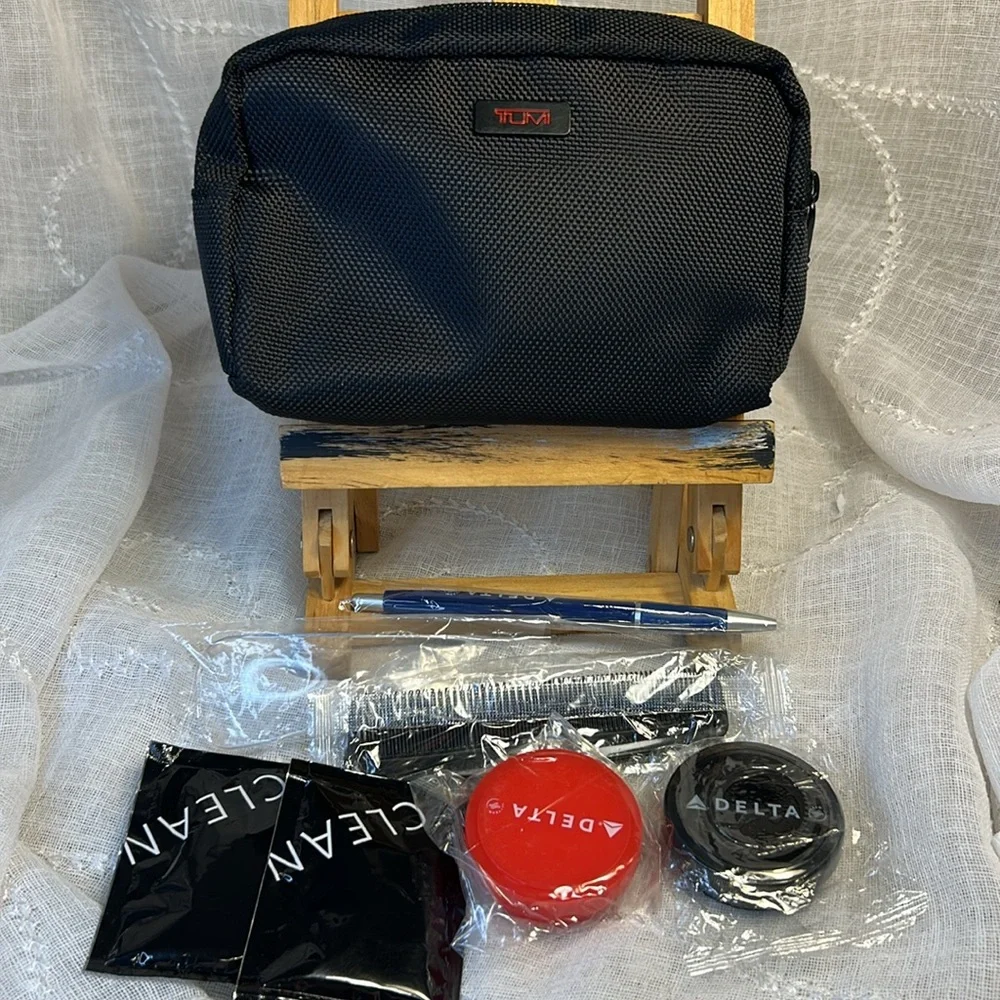 TUMI new never used cosmetic bag with some goodies